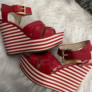 Beautiful red patent leather Michael Kors wedges.